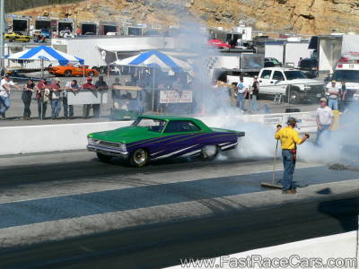 GREEN AND PURPLE NOVA DOING A BURNOUT GREEN AND PURPLE NOVA DOING A BURNOUT